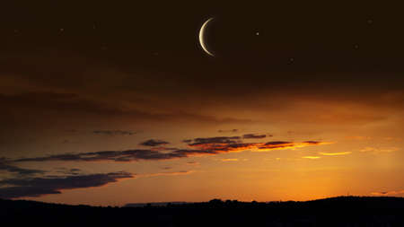 Crescent moon with beautiful sunset background