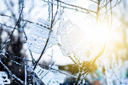 Christmas decorations on wooden background. mittens winter ornamentの写真素材