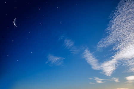 Ramadan background with a crescent and sunset sky. beautiful dawn in the morningの写真素材