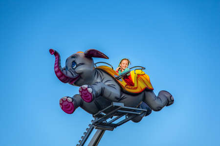 Little Girl in Amusement Park
