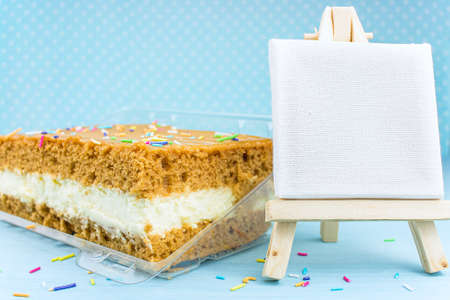 dessert cake with brown cakes and white filling