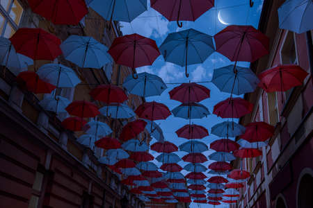 umbrellas and beautiful night sky on the city street