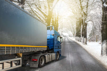 a truck on the winter road, Logistics and transportationの写真素材