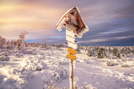 winter landscape in December, an indicator of the tourist route in the mountainsの写真素材