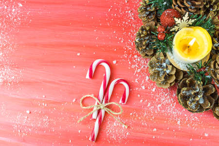 Christmas red background with Bible and rosary on the table, place for promotional text