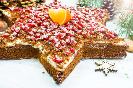 Star-shaped Christmas Cupcake, holiday cookies. Celebratory chocolate cupcake in the shape of the...