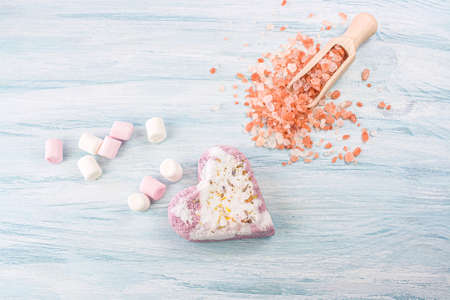 bath salt on a wooden table, body careの写真素材