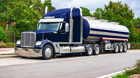 Motion blurred trucks on highway. Logistics and transportationの写真素材