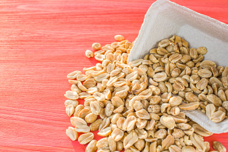 fried peanuts in a cardboard container, Nut - peanuts in carton, food delivery