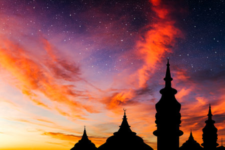 Ramadan background, fabulous mosque, silhouette of the Mosque against the background of a colorful skyの写真素材