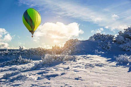 a balloon amid snow in the mountains of Europe. scan from flight altitude.の写真素材