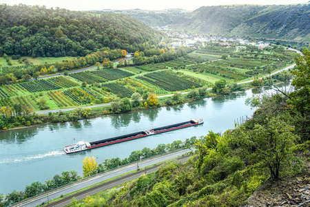 The barge on the river. transport for the delivery of large goods along the riverの写真素材