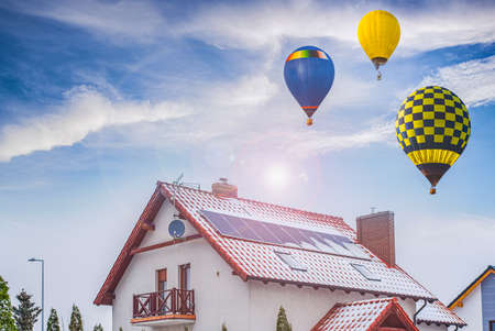 a balloon flies against the sky. winter landscape from a height ofの写真素材