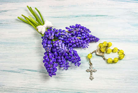 background of religion. cross on the table. prayer beads on the tableの写真素材