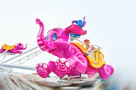 Children's attraction carousel, summer vacationの写真素材