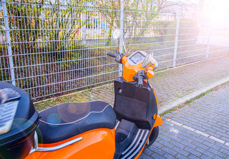 Scooter for hire, come to workの写真素材