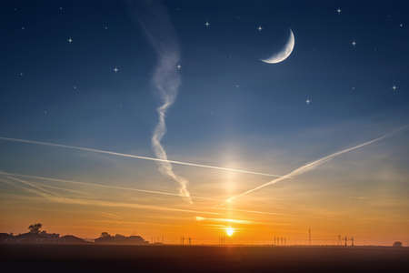Crescent on the background of sunset, religion