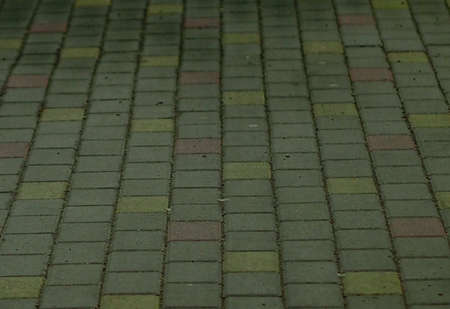 Paving slabs in the form of multi-colored paving stones.の写真素材