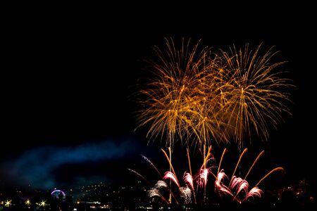 Fireworks of the festivities of Bouzas, in Vigo (Spain) on a beautiful summer nightの写真素材