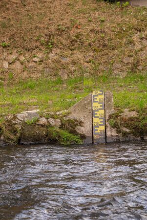 Measurement of river water height. Measurement scale.