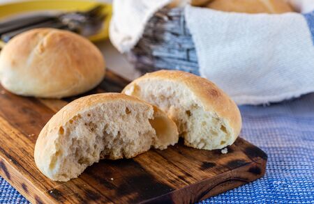 Fresh wheat buns. Homemade bread. Home cooking. Family breakfast. Fragrant bread rolls. Cooking together. Perfect for breakfast.の写真素材