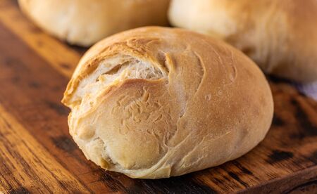 Fresh wheat buns. Homemade bread. Home cooking. Family breakfast. Fragrant bread rolls. Cooking together. Perfect for breakfast.の写真素材