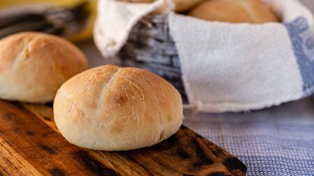 Fresh wheat buns. Homemade bread. Home cooking. Family breakfast. Fragrant bread rolls. Cooking together. Perfect for breakfast.の写真素材