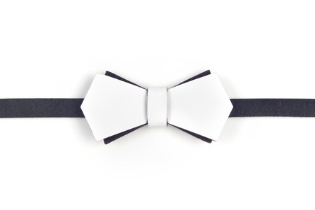 Black and white bow-tie makes you elegant and expressive person in any place. Isolated on white backgroundの写真素材