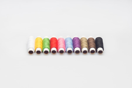 Ten good multi-colored threads for all needs  Isolated on the white background