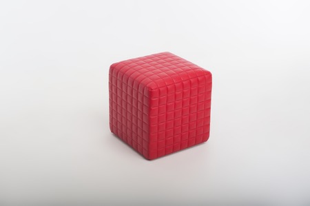 Wonderful red padded stool isolated on white background