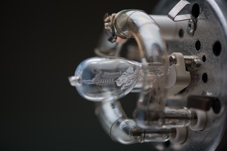 The internal structure of cinema projector side view  Isolated on black background