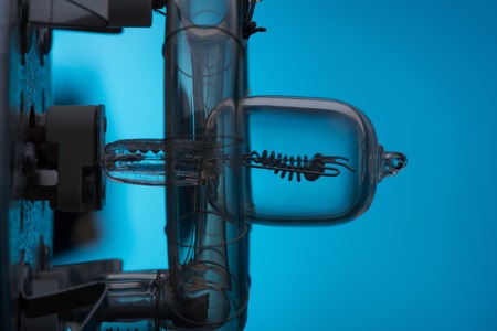 The internal structure of turned on spotlight side view  Isolated on blue backgroundの写真素材