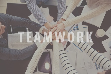 As one. Inspiration words on image of stack of hands backgroundの写真素材