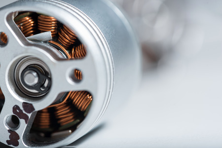 Working detail. Close up of copper motor armature as a part of a drone.の写真素材