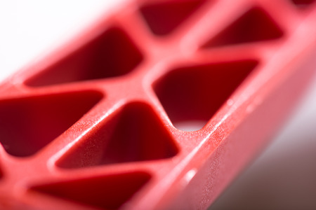 Bright detail. Close up of red reinforcing rib of droneの写真素材