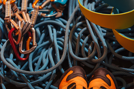 Ready for it. Close up of boots for climbing and insurance ropes as special equipment.の写真素材
