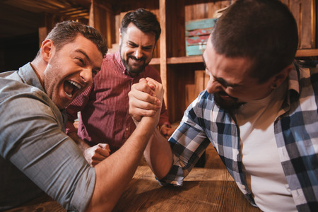 Good looking attractive men confronting each otherの写真素材
