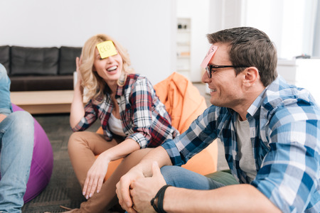 Handsome good looking man wearing a sticky noteの写真素材