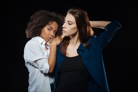 Seductive amazing models staying close to each otherの写真素材