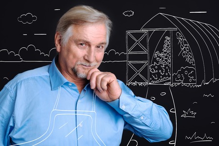 Cheerless depressed man standing on the streetの写真素材
