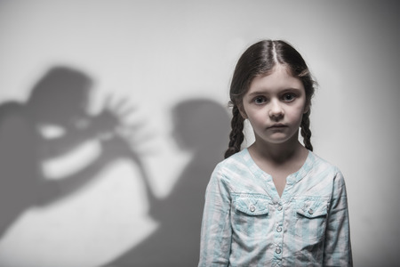 Portrait of young girl expressing despairの写真素材