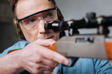 Good looking handsome man wearing safety glassesの写真素材