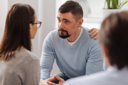 Worried office worker looking forwardの写真素材
