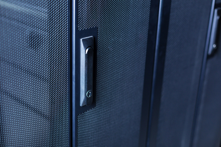 Close up of a button in the server roomの写真素材