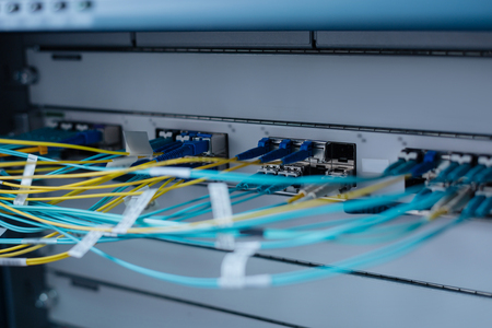 Network cables connected to switchの写真素材