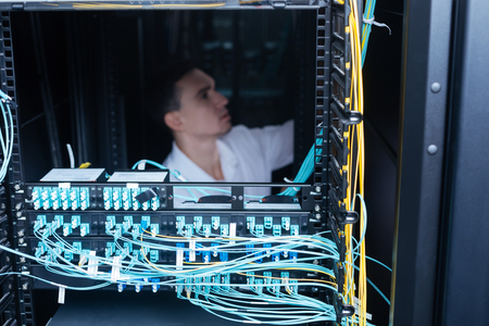 Ethernet cables being connected to the data serverの写真素材