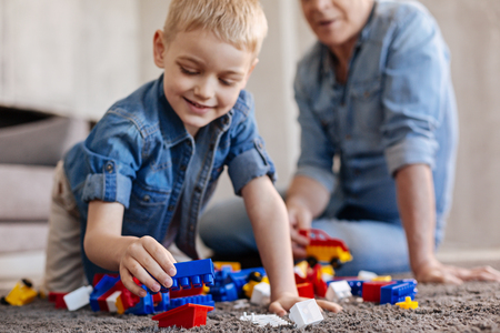 Gifted observant kid putting pieces togetherの写真素材