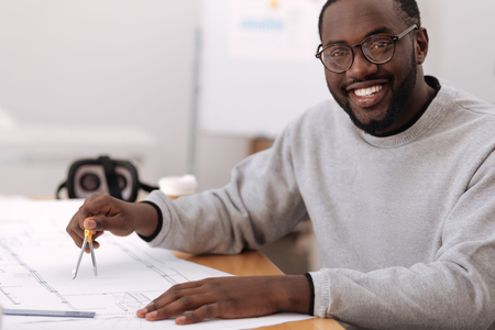 Nice joyful architect working on the projectの写真素材