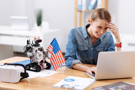 Involved engineer enjoying working responsibilities in the officeの写真素材