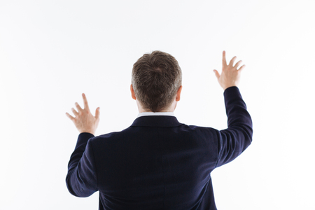 Devoted inspired man managing the processの写真素材